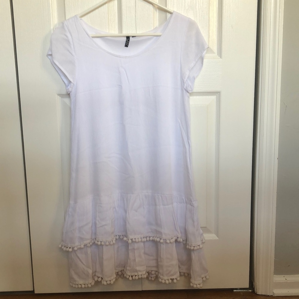 White dress with tassels